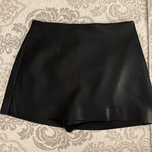 Faux leather skort. Super comfy and chic. Can dress it up or down.